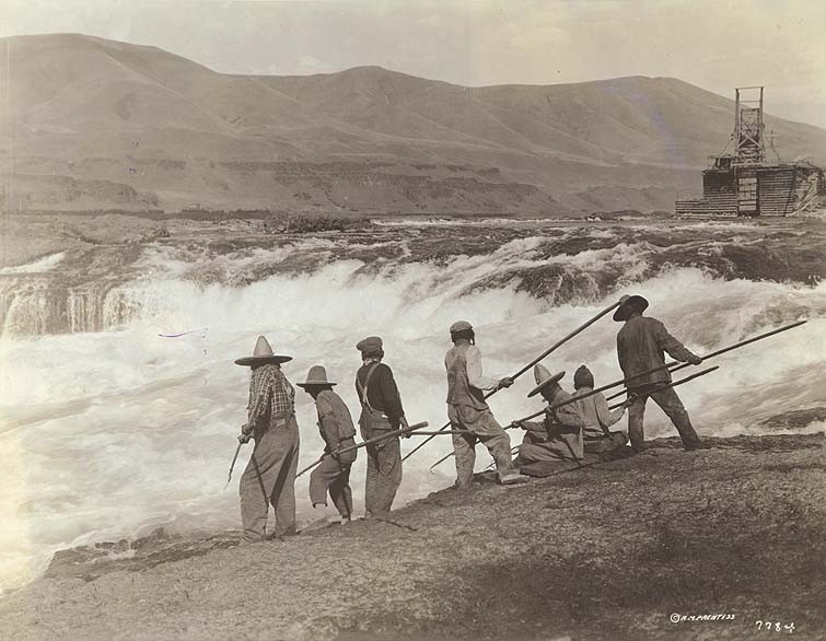 Fishermen at historic Celilo Falls, now under the backwater of The Dalles dam.